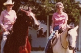 Mother and Donice on horses cr again note window